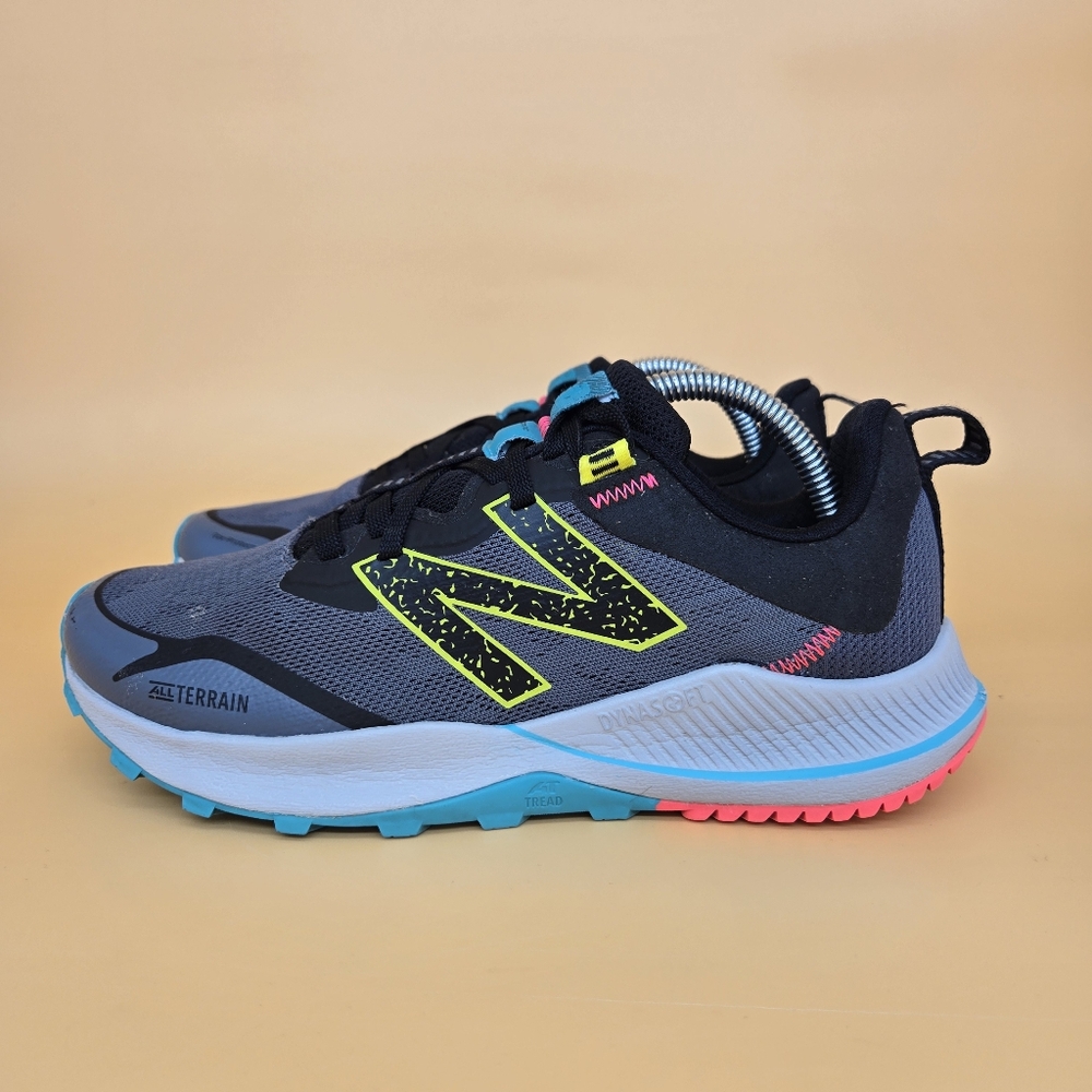 New Balance Gray and Black Athletic Shoes with Trail Design